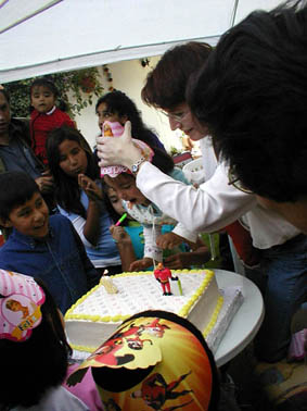 Raphaela blowing candle at her third Birthday