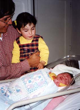 Natasha visiting newborn Kamila at clinica CEMES in La Paz