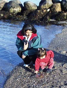 Dionicia and Kamila checking out a jellyfish